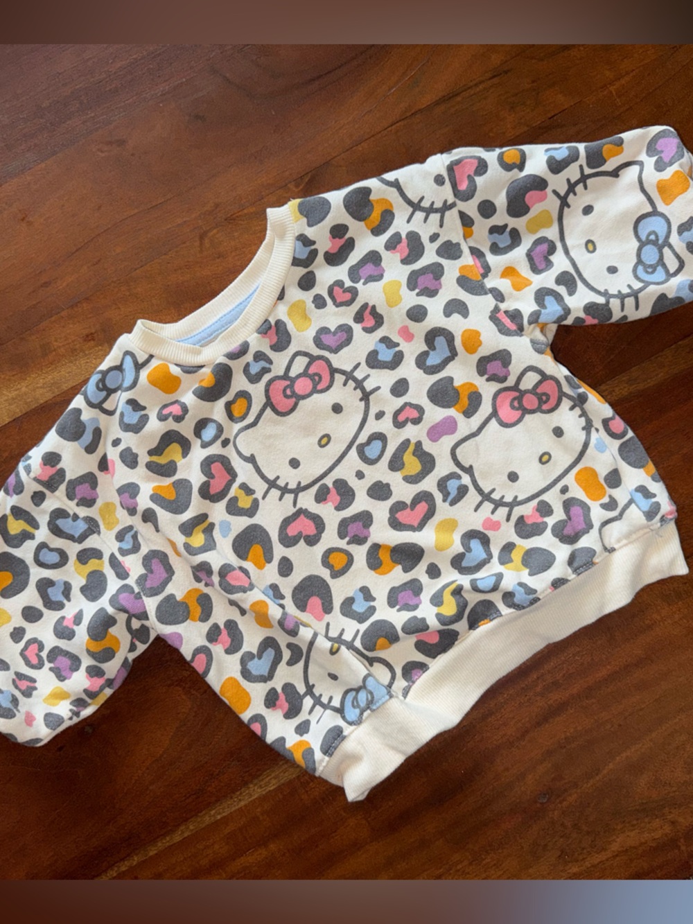Hello Kitty White Pullover Sweatshirt with‎ Multicolor Leopard Hearts